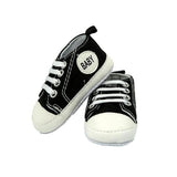 Zebra wrap black shoes nappy cake. Bespoke baby gifts. Baby shower gifts. Swaddle. Baby gifts. Muslin wrap. Baby shower gift ideas. Newborn baby gifts. bibs. chocolates. unisex baby gifts. baby presents. online gifts. baby gifts australia. baby shower presents. 